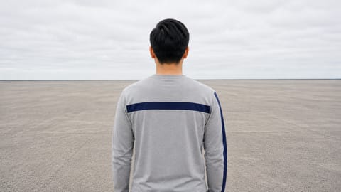 Behind